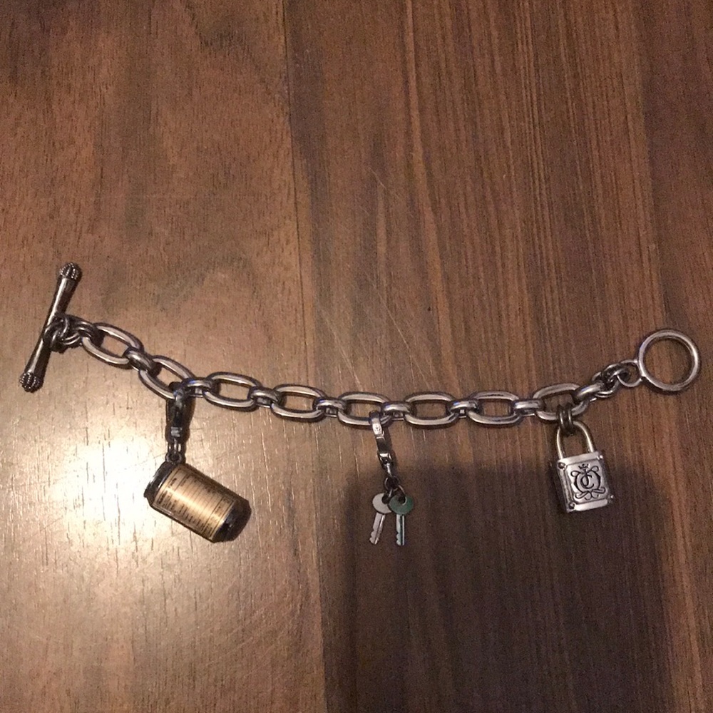 Beautiful juicy couture charm bracelet with charms